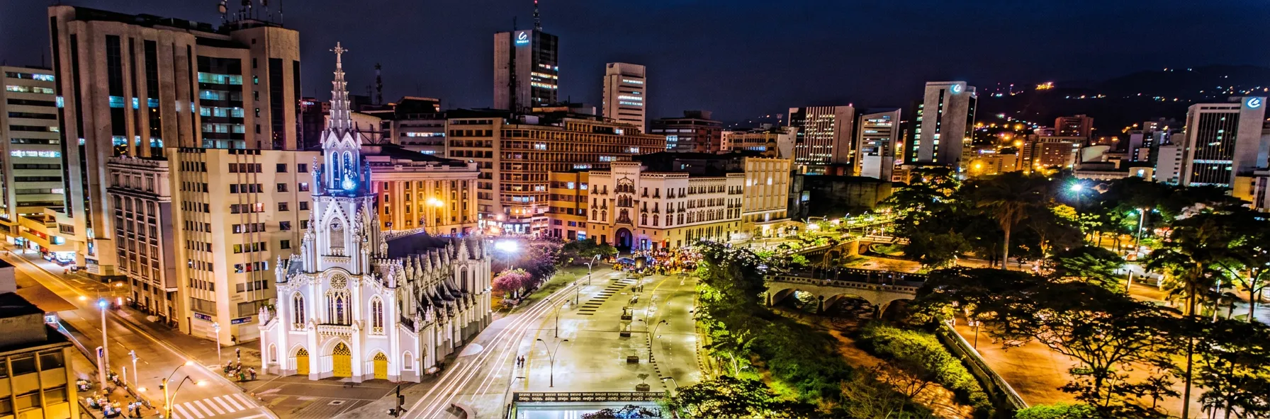 Panoramic view of Cali with the La Ermita Church at sunset